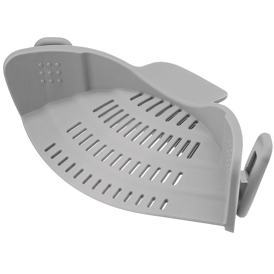 Gray corner shelf with slotted design on a white background
